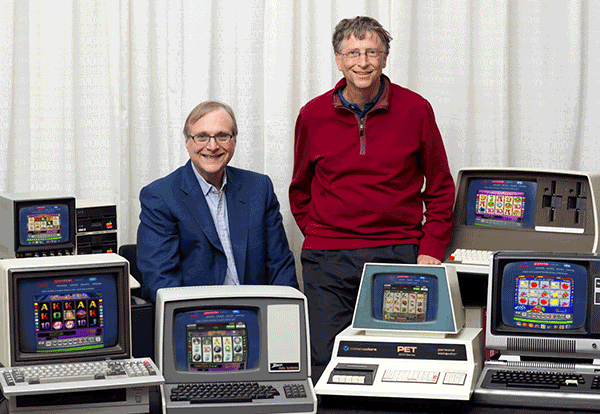 Билл Гейтс со своим другом играют сразу на нескольких компьютерах в игровом клубе Вулкан на деньги Онлайн игровой клуб Вулкан за настоящие деньги